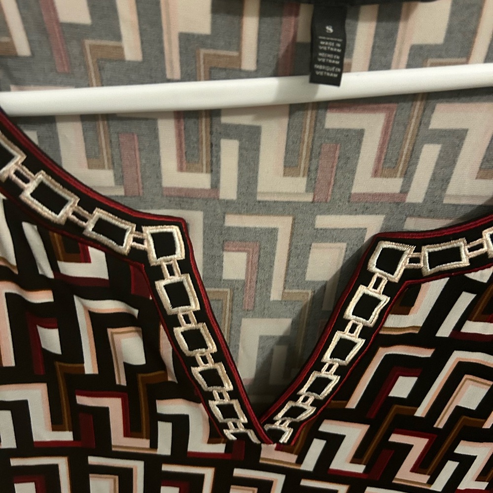 Geometric Patterned Top with Chain Detail